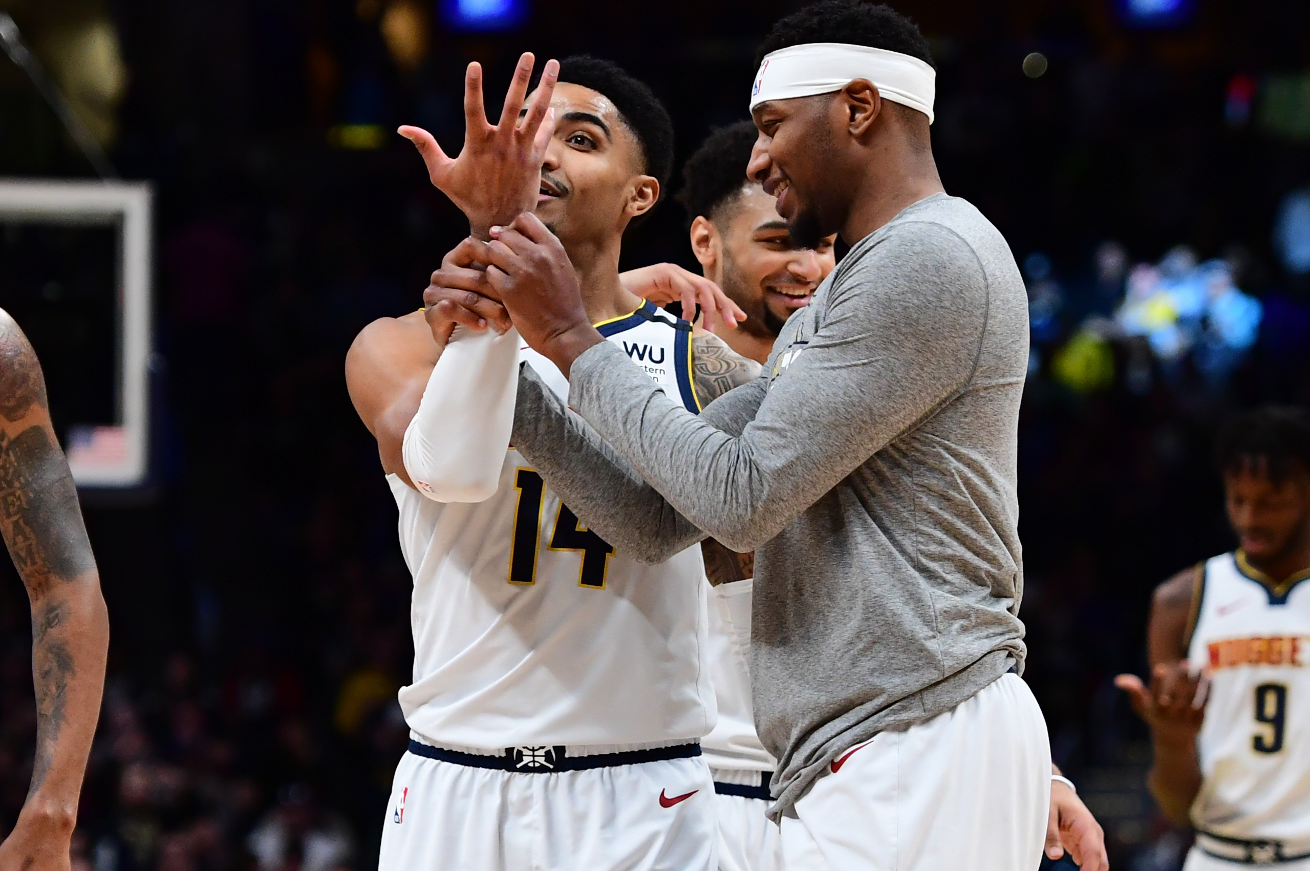NBA: Toronto Raptors at Denver Nuggets Denver Nuggets forward Torrey Craig (3) grabs the arm of guard Gary Harris (14) following a basket in the fourth quarter against the Toronto Raptors at the Pepsi Center.