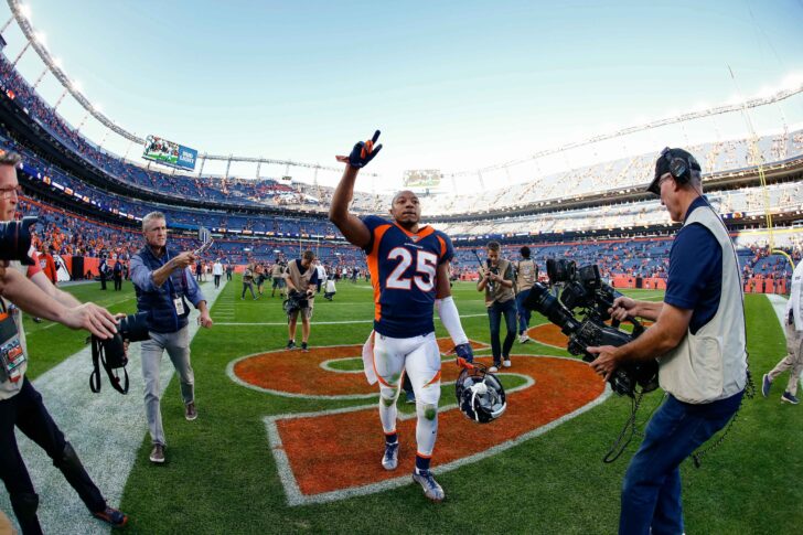 Denver Broncos cornerback Chris Harris Jr. (25) motions as he leaves the field after the game against the Tennessee Titans at Empower Field at Mile High.