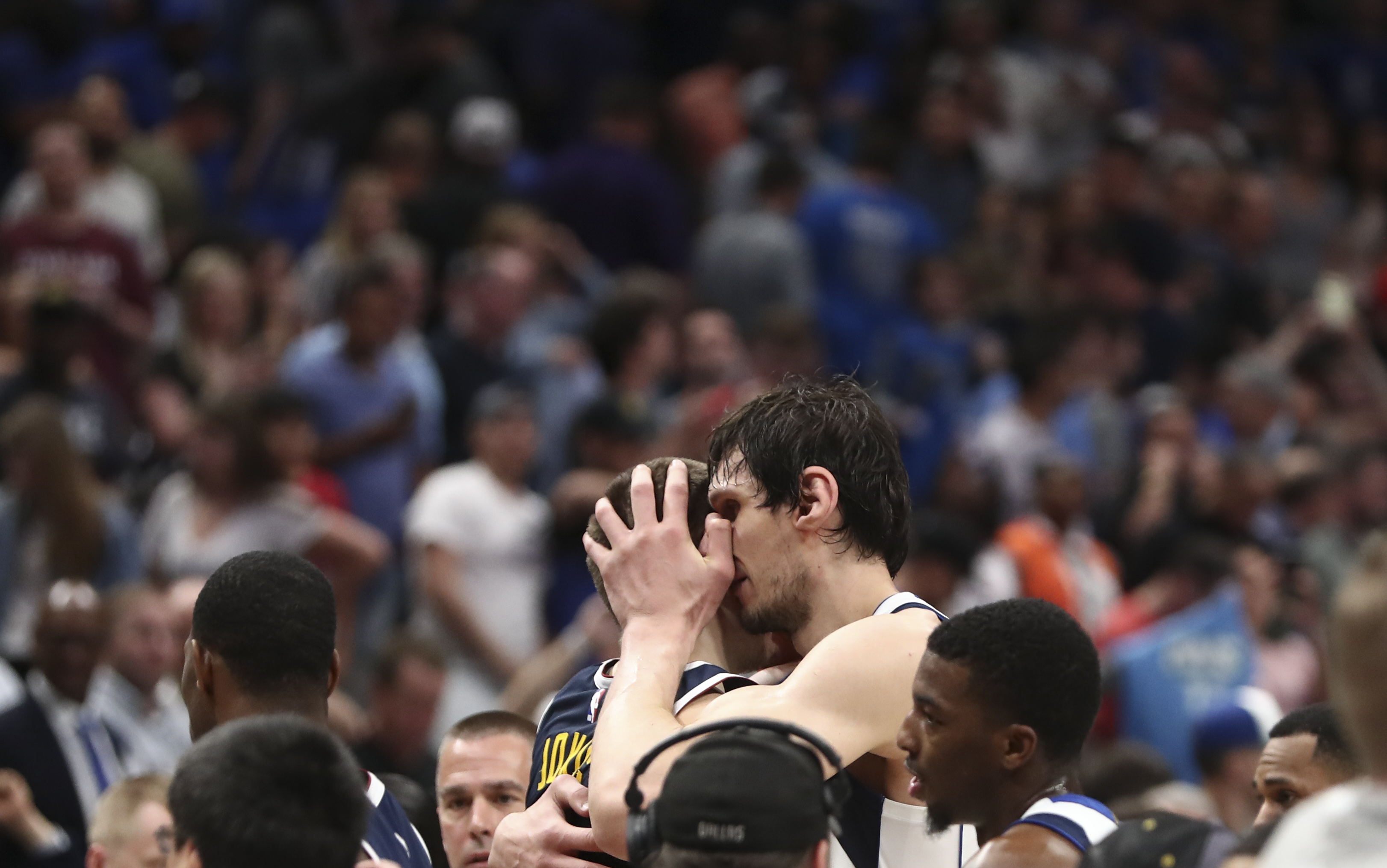 NBA: Denver Nuggets at Dallas Mavericks Dallas Mavericks center Boban Marjanovic (51) hugs Denver Nuggets center Nikola Jokic (15) after the game at American Airlines Center.