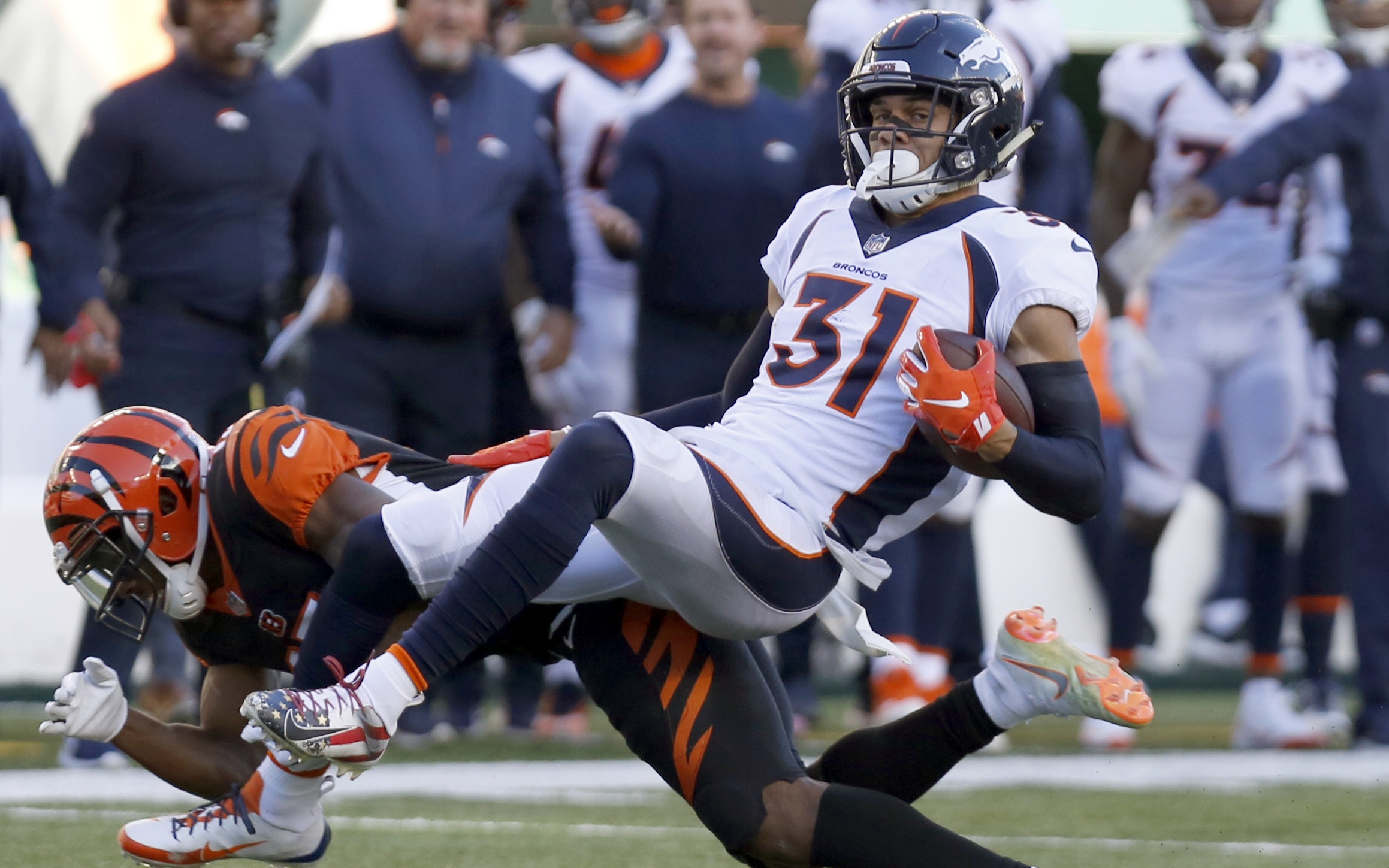 USATSI_11777208 Cropped Justin Simmons picks off a pass in 2018. Credit: David Kohl, USA TODAY Sports.