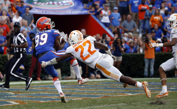 Florida Gators wide receiver Tyrie Cleveland (89) catches the ball for a touchdown as time expires to win the game as Tennessee Volunteers defensive back Micah Abernathy (22) attempted to defend during the second half at Ben Hill Griffin Stadium.