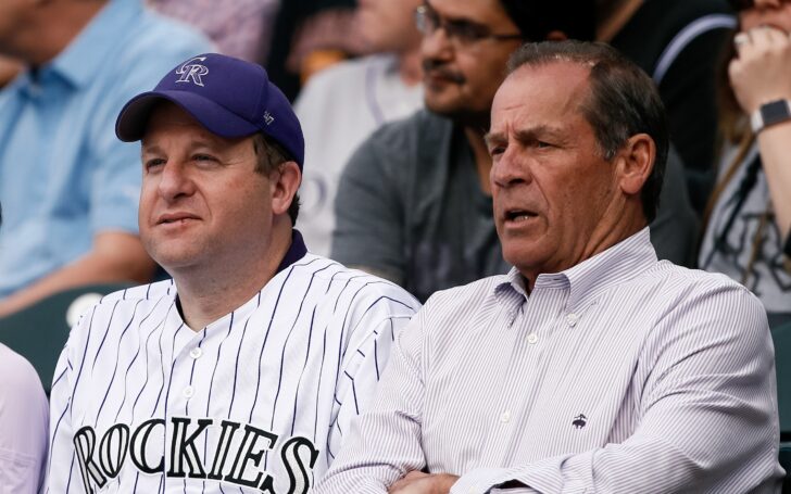 Jared Polis (left) with Rockies owner Dick Monfort at Coors Field in 2019. Credit: Isaiah J. Downing, USA TODAY Sports.