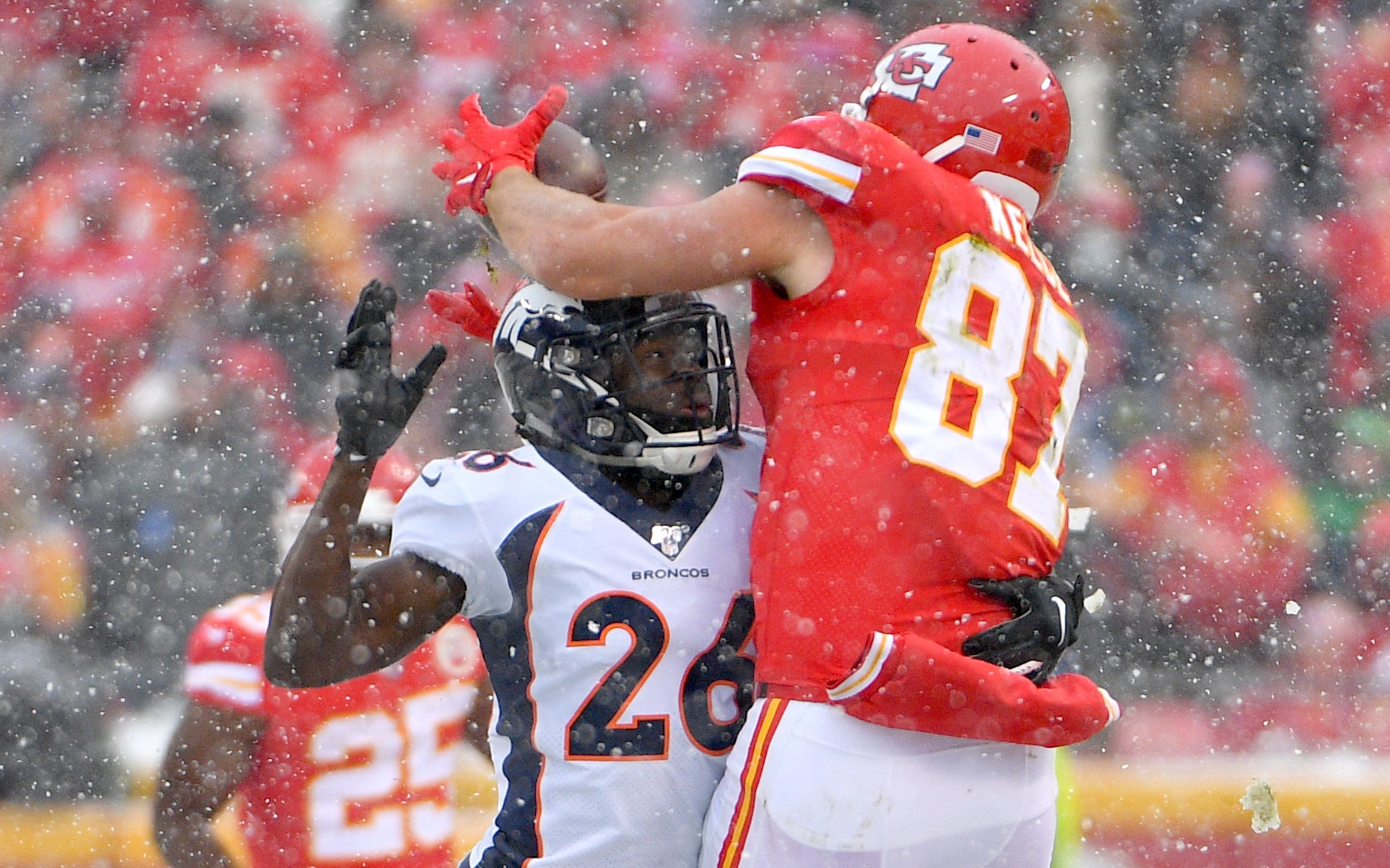 USATSI_13834836 Cropped Yiadom makes a play on Travis Kelce. Credit: Denny Medley, USA TODAY Sports.