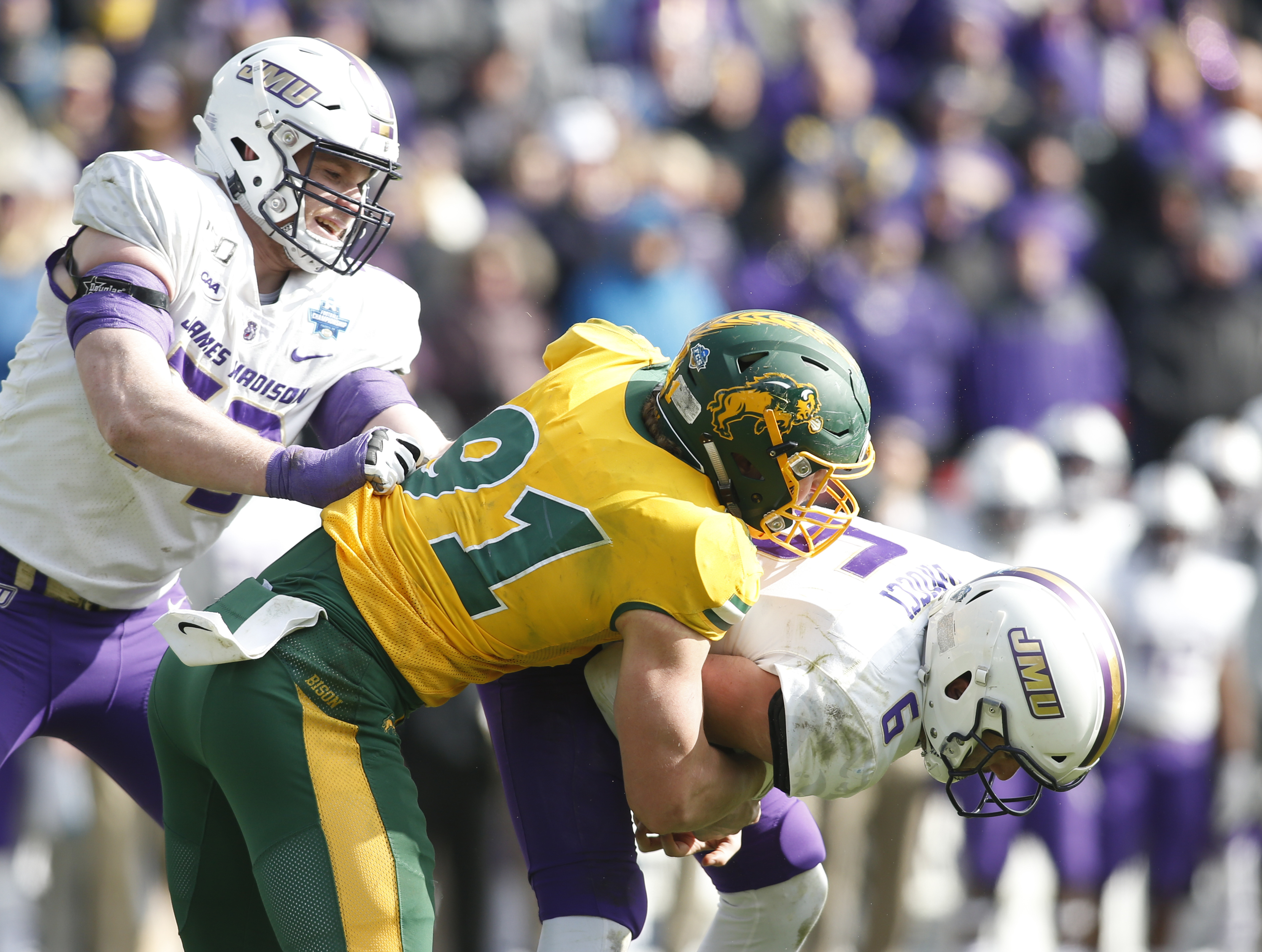 NCAA Football: FCS Championship Game-North Dakota State vs James Madison North Dakota State Bison defensive end Derrek Tuszka (91) sacks James Madison Dukes quarterback Ben DiNucci (6) in the fourth quarter at Toyota Stadium.