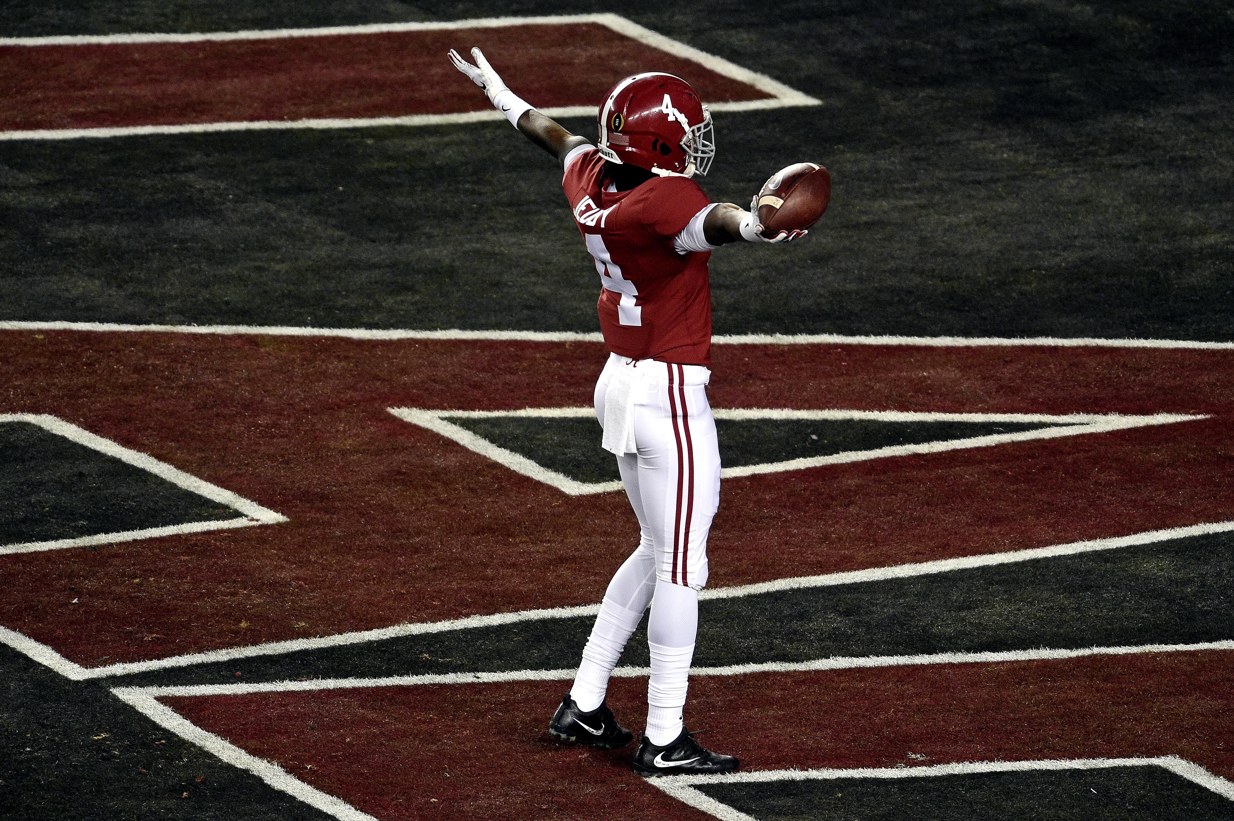 Alabama Crimson Tide wide receiver Jerry Jeudy (4) celebrates a touchdown pass during the first quarter against the Alabama Crimson Tide during the 2019 College Football Playoff