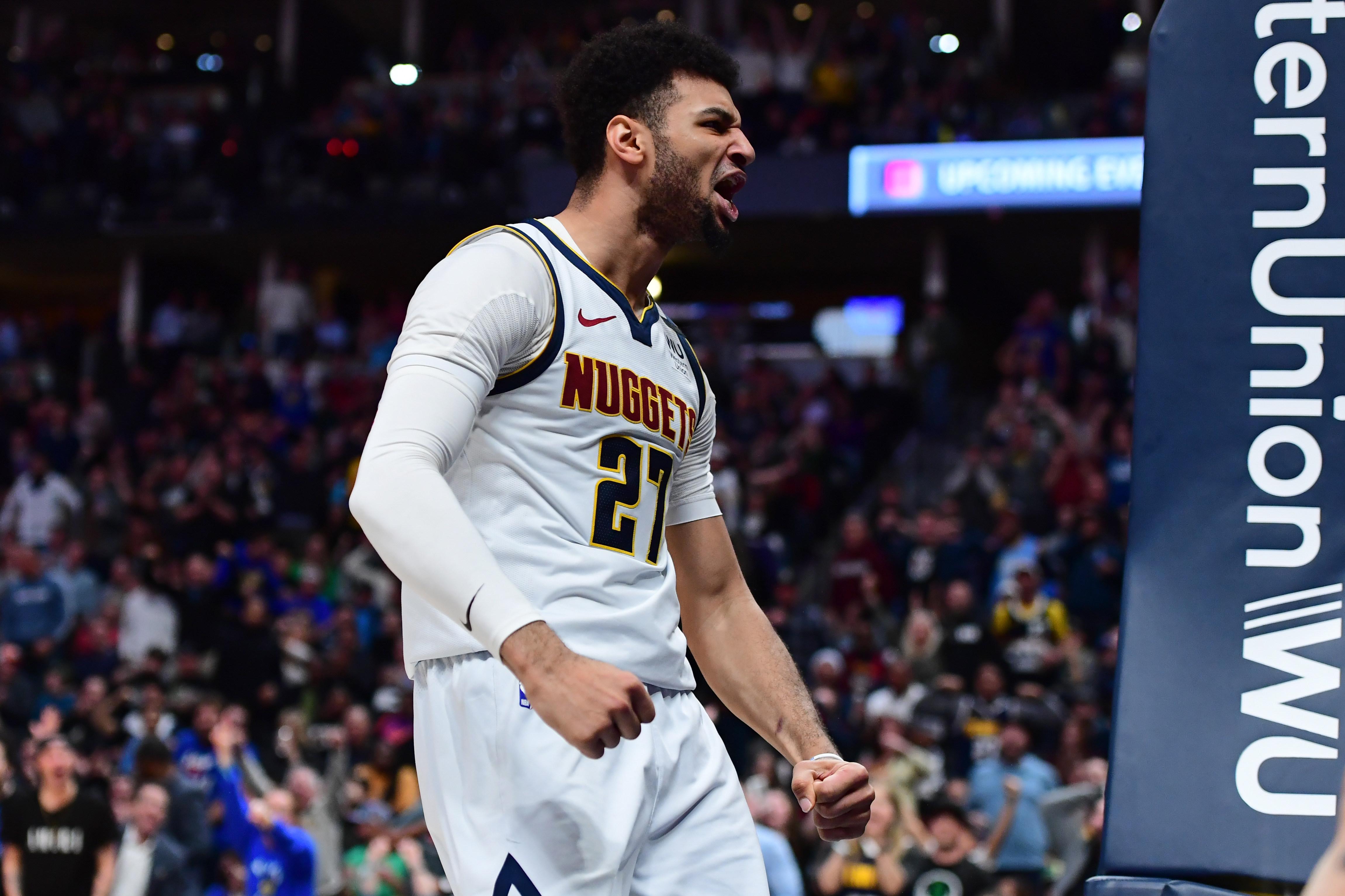 Denver Nuggets guard Jamal Murray (27) reacts following his basket in the third quarter against the Milwaukee Bucks at the Pepsi Center.
