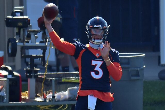 Drew Lock passes at Broncos training camp. Credit: Ron Chenoy, USA TODAY Sports.