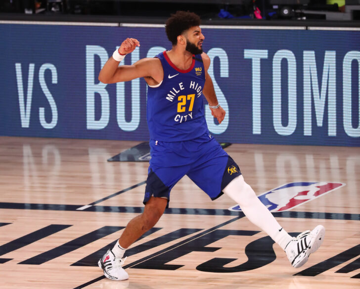 Denver Nuggets guard Jamal Murray (27) celebrates after making a three point basket against the Utah Jazz during the fourth quarter in game six of the first round of the 2020 NBA Playoffs at AdventHealth Arena.