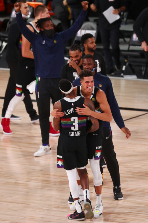 Denver Nuggets forward Torrey Craig (3) celebrates with forward Michael Porter Jr. (1) after defeating the Utah Jazz in game seven of the first round of the 2020 NBA Playoffs at ESPN Wide World of Sports Complex.