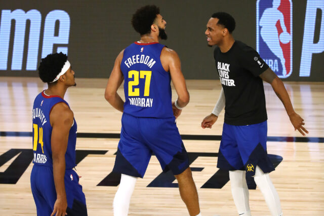Denver Nuggets guard Jamal Murray (27) celebrates with teammates after making a three point basket against the LA Clippers during the second half of game five in the second round of the 2020 NBA Playoffs at ESPN Wide World of Sports Complex.