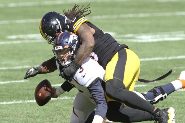 Drew Lock sacked and injured by Bud Dupree of the Steelers. Credit: Charles LeClaire, USA TODAY Sports.