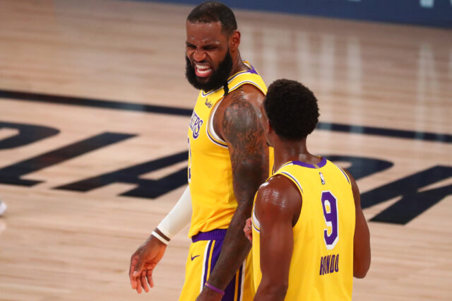 Los Angeles Lakers forward LeBron James (23) walks with guard Rajon Rondo (9) during the second half against the Denver Nuggets in game four of the Western Conference Finals of the 2020 NBA Playoffs at AdventHealth Arena.