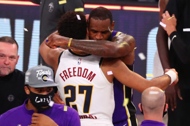 Los Angeles Lakers forward LeBron James (23) greets Denver Nuggets guard Jamal Murray (27) after game five of the Western Conference Finals of the 2020 NBA Playoffs at AdventHealth Arena.