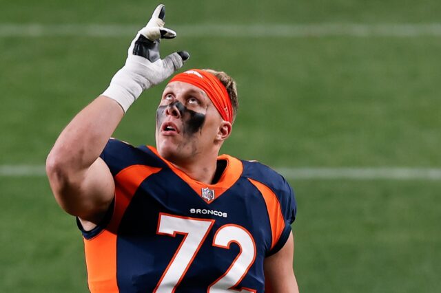 Garett Bolles points to the sky. Credit: Isaiah J. Downing, USA TODAY Sports.