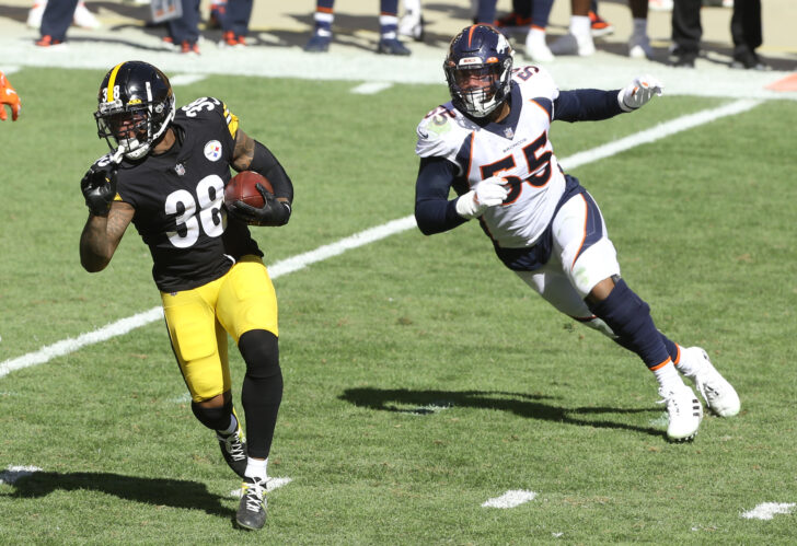 Pittsburgh Steelers running back Jaylen Samuels (38) runs the ball as Denver Broncos outside linebacker Bradley Chubb (55) chases during the third quarter at Heinz Field. The Steelers won 26-21.