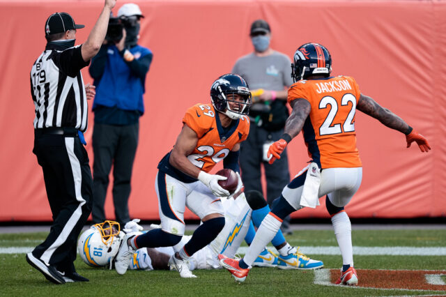 Bryce CallahNov 1, 2020; Denver, Colorado, USA; Denver Broncos cornerback Bryce Callahan (29) celebrates with strong safety Kareem Jackson (22) after intercepting a pass intended for Los Angeles Chargers wide receiver Mike Williams (81) in the third quarter at Empower Field at Mile High. Mandatory Credit: Isaiah J. Downing-USA TODAY Sportsan and s
