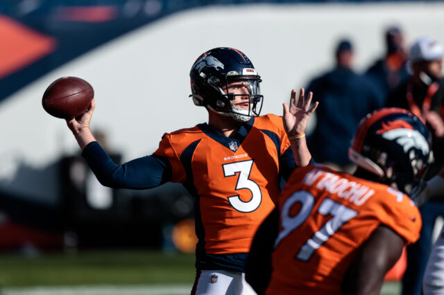 Denver Broncos quarterback Drew Lock (3) warms up before the game against the Miami Dolphins at Empower Field at Mile High.