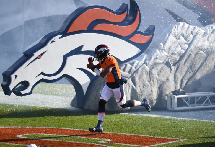 Denver Broncos quarterback Kendall Hinton (2) hits the field prior to the game against the New Orleans Saints in the first quarter at Empower Field at Mile High.