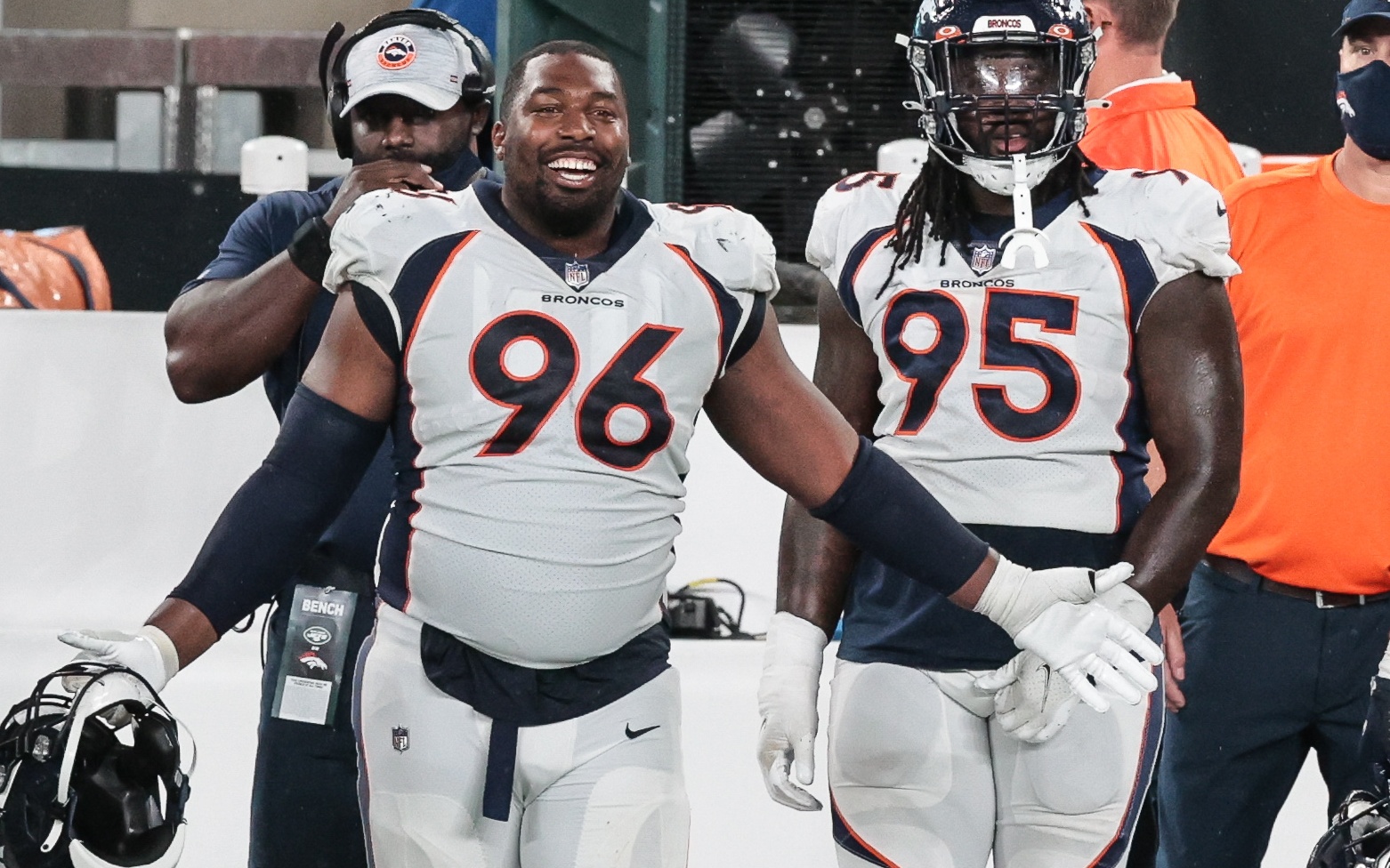 Denver Broncos defensive tackle Mike Purcell (98) walks toward the