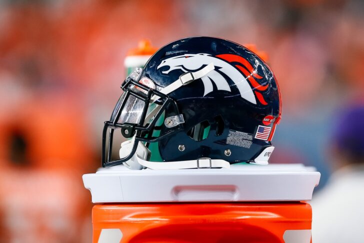 A detail view of a Denver Broncos helmet on the sidelines in the fourth quarter against the Arizona Cardinals at Broncos Stadium at Mile High.