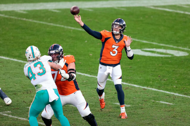 Denver Broncos quarterback Drew Lock (3) attempts a pass as offensive tackle Garett Bolles (72) defends against Miami Dolphins linebacker Andrew Van Ginkel (43) in the third quarter at Empower Field at Mile High.