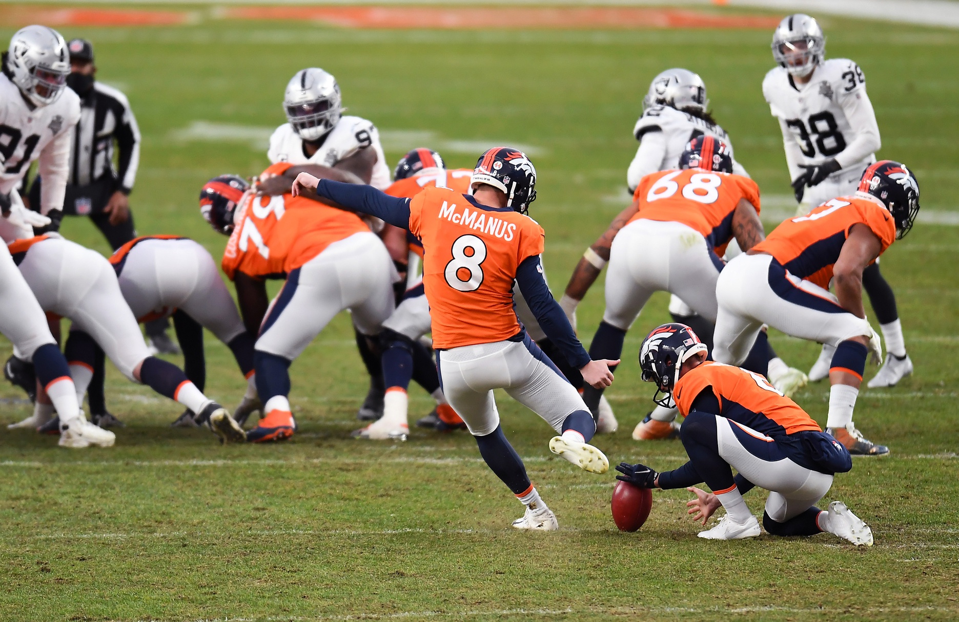 Denver Broncos kicker Brandon McManus (8) attempts a field goal against the Las Vegas Raiders during the second quarter at Empower Field in Mile High.