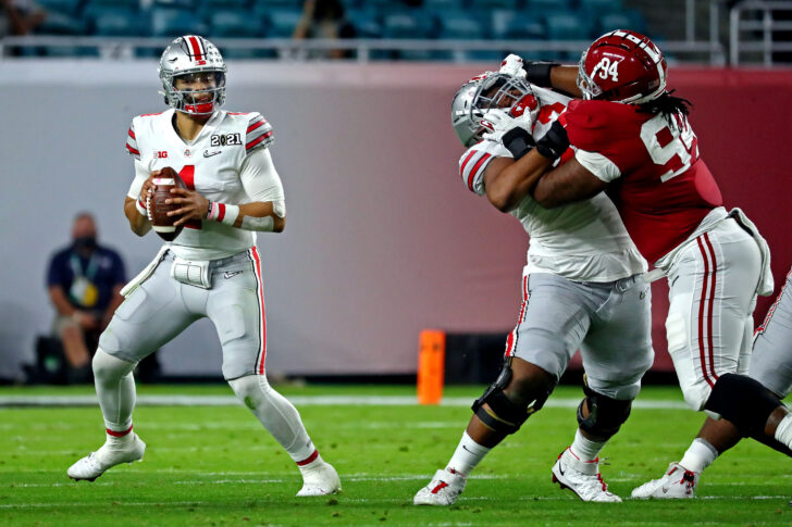 Ohio State Buckeyes quarterback Justin Fields (1) throws a pass during the second quarter against the Alabama Crimson Tide in the 2021 College Football Playoff National Championship Game.