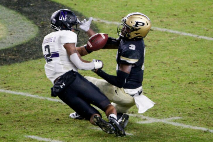 Purdue wide receiver David Bell (3) pulls in a catch in front of Northwestern defensive back Greg Newsome II (2) during the second quarter of a NCAA football game, Saturday, Nov. 14, 2020 at Ross-Ade Stadium in West Lafayette.