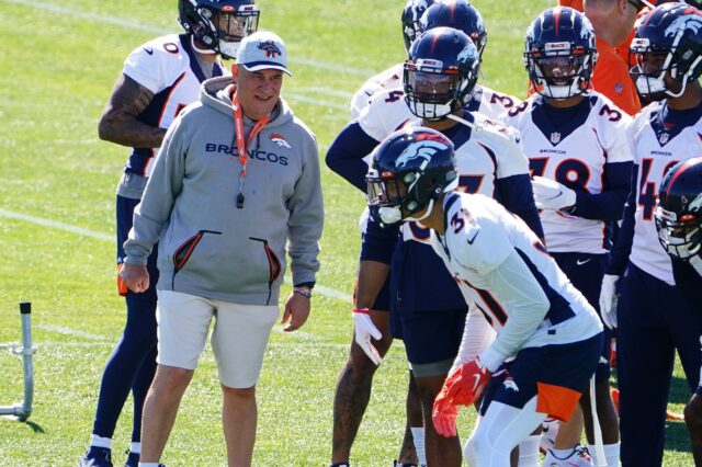 Vic Fangio with his team in May. Credit: Ron Chenoy, USA TODAY Sports.