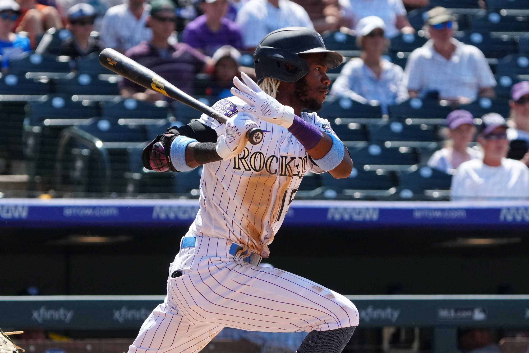 Images from the Milwaukee Brewers' 7-6 win over the Colorado Rockies