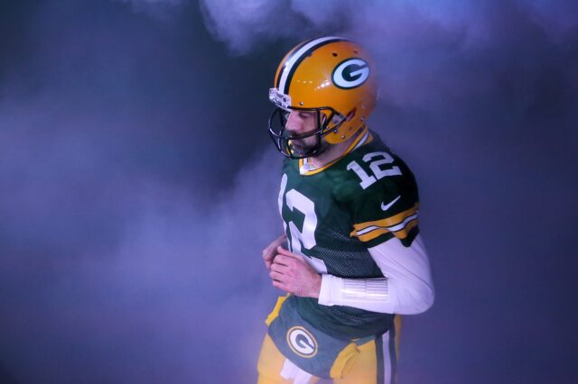 Aaron Rodgers runs out of the tunnel in Green Bay. Credit: Mike De Sisti, USA TODAY Sports.
