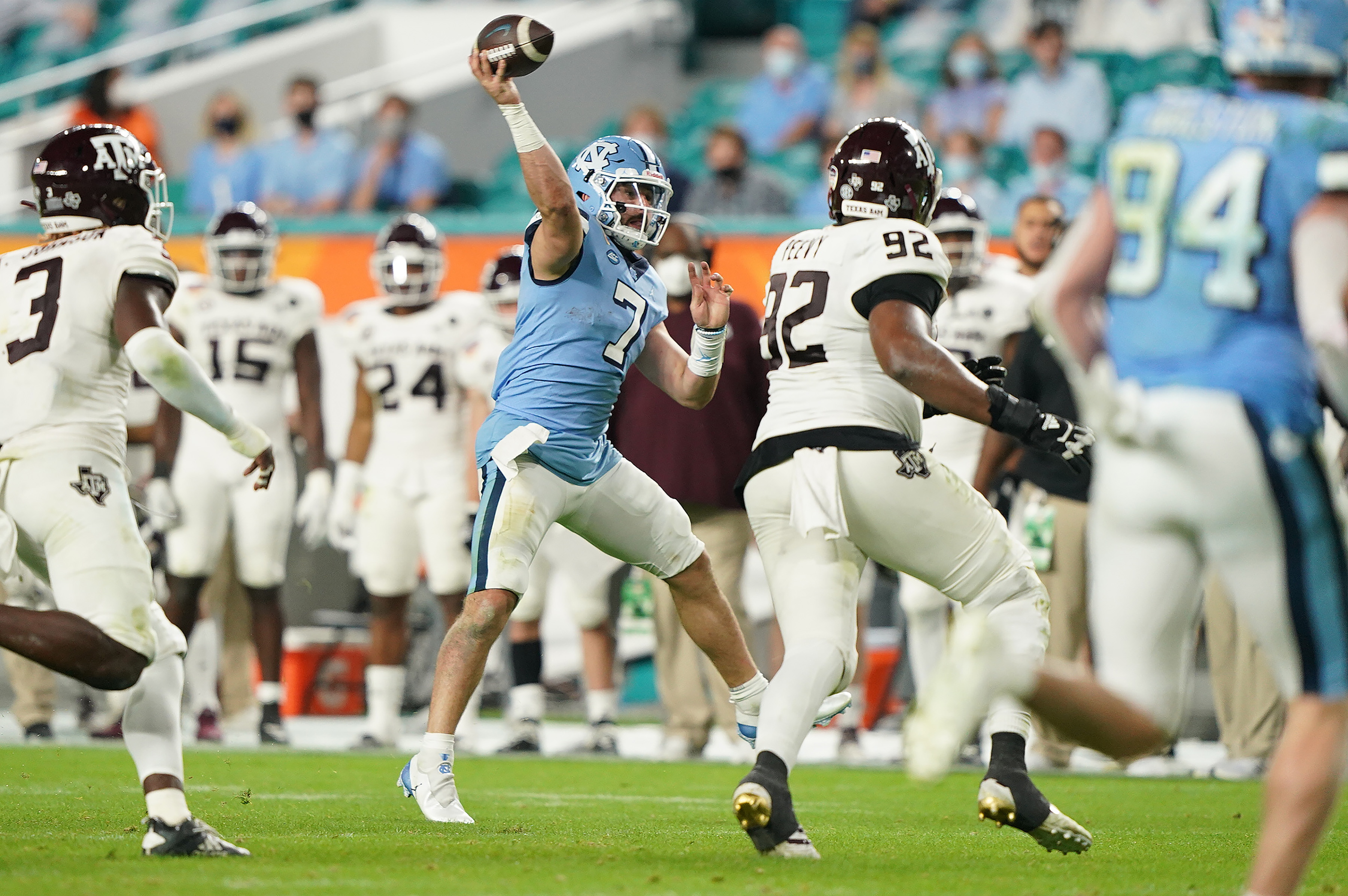 North Carolina Tar Heels quarterback Sam Howell (7) gets off a pass against the Texas A&M Aggies during the second half at Hard Rock Stadium.