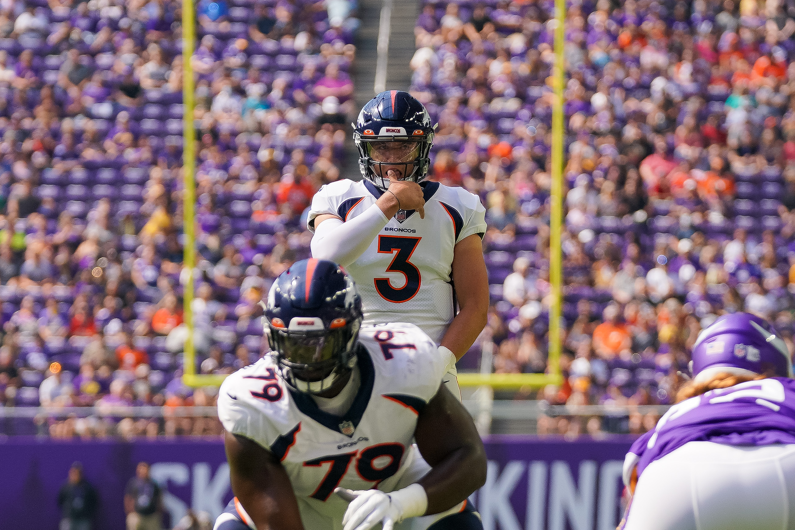 Denver Broncos quarterback Drew Lock (3) under center against the Minnesota Vikings in the first quarter at U.S. Bank Stadium.