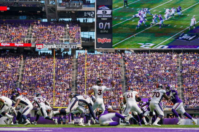 Denver Broncos quarterback Drew Lock (3) passes against the Minnesota Vikings in the first quarter at U.S. Bank Stadium.