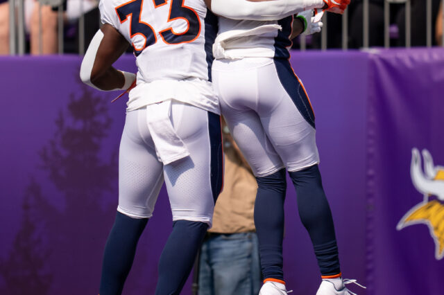 Denver Broncos wide receiver K.J. Hamler (1) celebrates his touchdown with running back Javonte Williams (33) against the Minnesota Vikings in the first quarter at U.S. Bank Stadium.