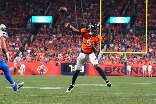 Denver Broncos quarterback Teddy Bridgewater (5) throws a touchdown pass against the Los Angeles Rams in the second quarter during a preseason game at Empower Field at Mile High.