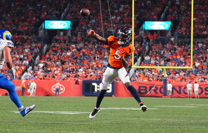 Denver Broncos quarterback Teddy Bridgewater (5) throws a touchdown pass against the Los Angeles Rams in the second quarter during a preseason game at Empower Field at Mile High.
