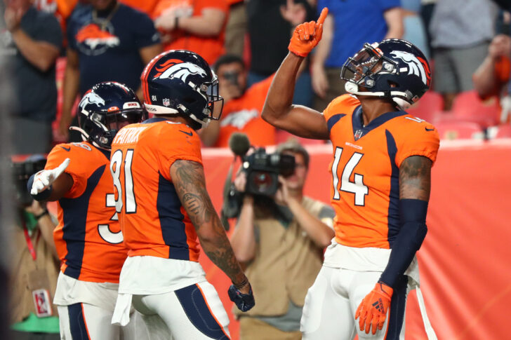 Denver Broncos wide receiver Courtland Sutton (14) celebrates after a touchdown catch against the Los Angeles Rams during the second quarter at Empower Field at Mile High.