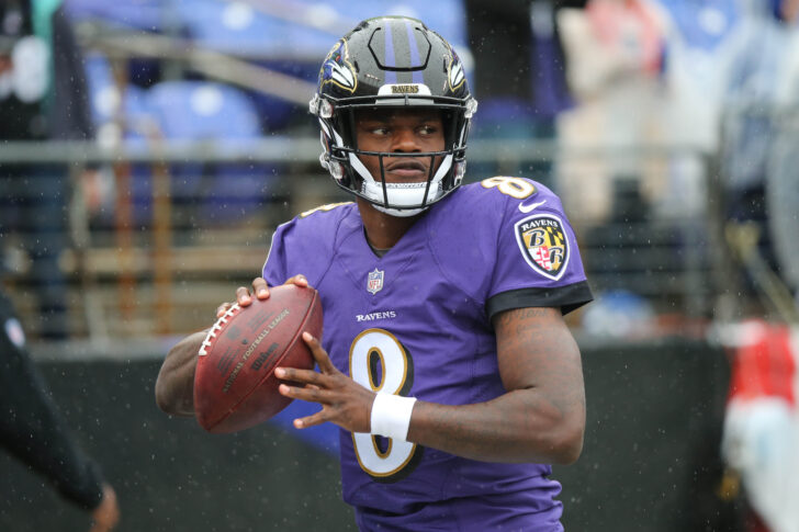 Baltimore Ravens quarterback Lamar Jackson (8) warms up prior to a game against the Denver Broncos at M&T Bank Stadium.