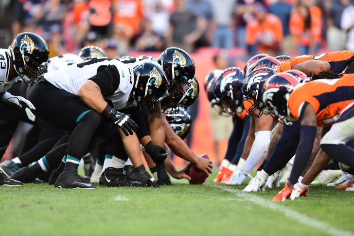 The Jacksonville Jaguars and the Denver Broncos line up for the final play of the fourth quarter at Empower Field at Mile High.
