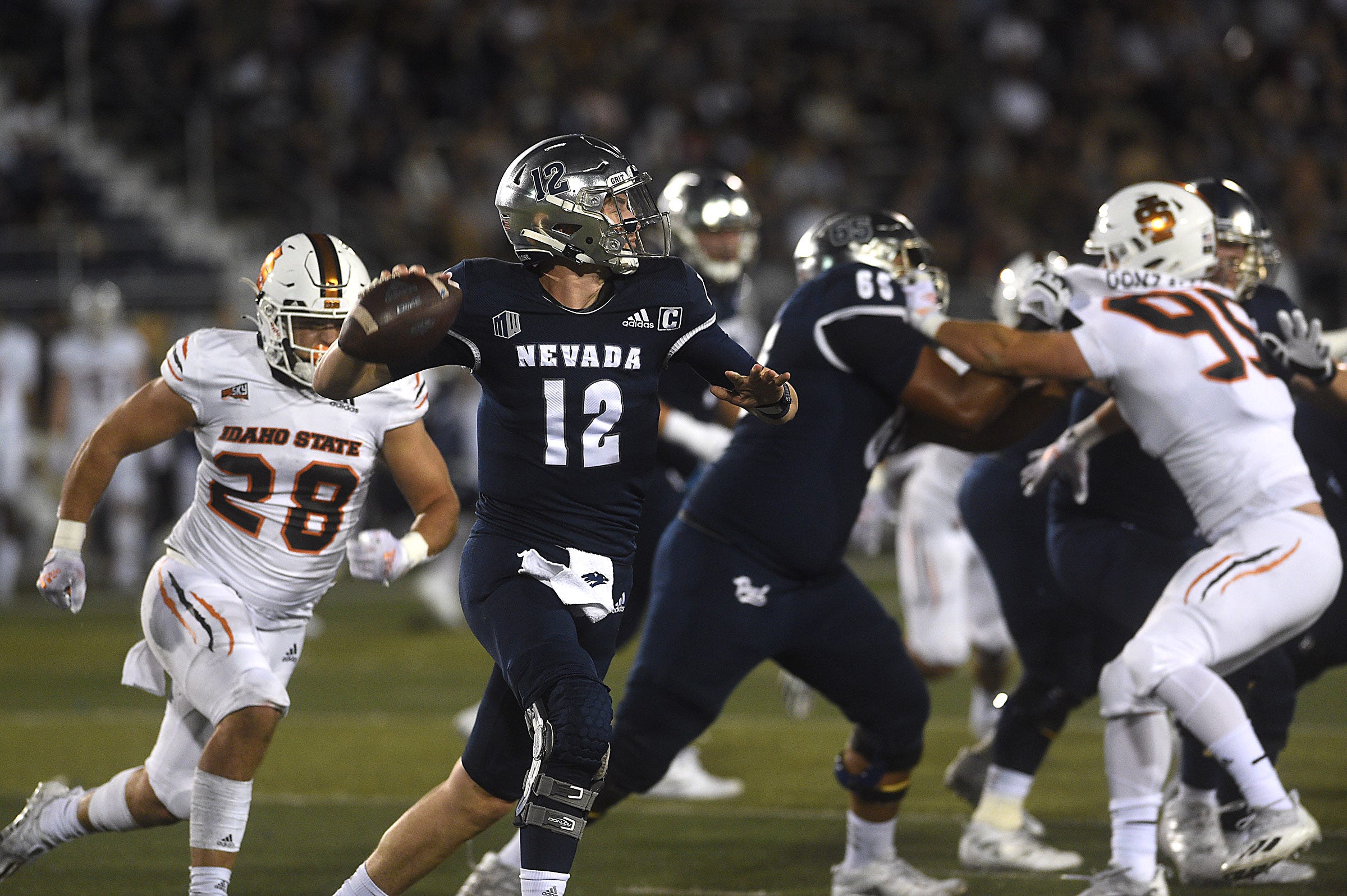 Nevada's Carson Strong looks to throw while taking on Idaho State at Mackay Stadium in Reno on Sept. 11, 2021.