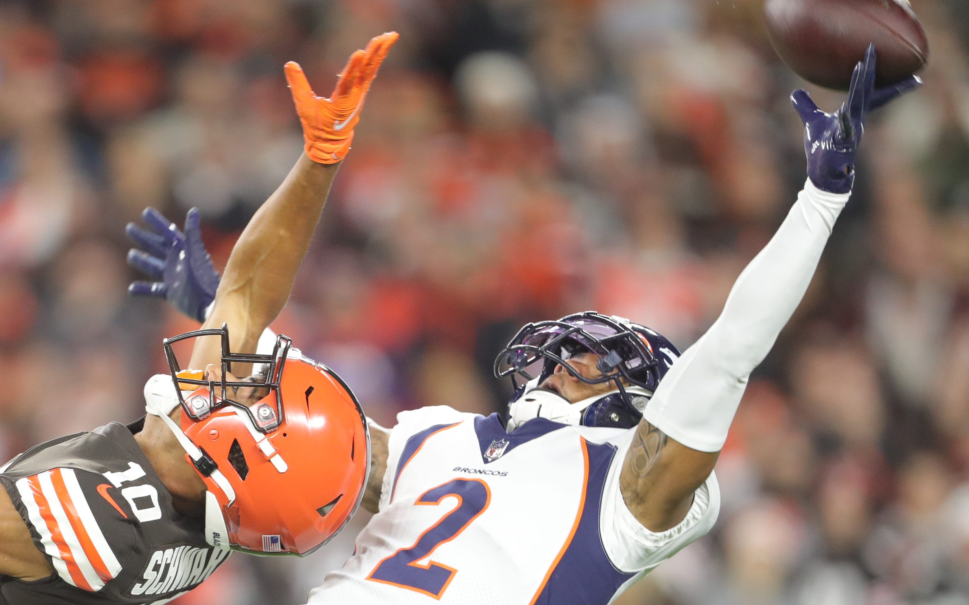 Patrick Surtain defends a pass against the Browns. Credit: Phil Masturzo, USA TODAY Sports.