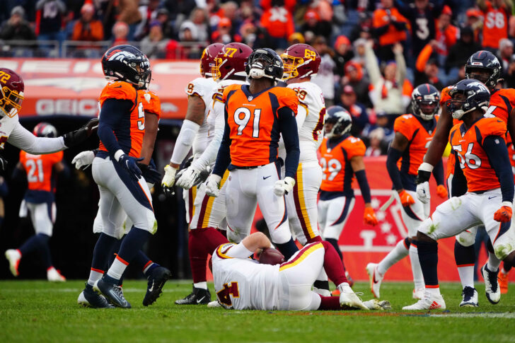 Denver Broncos outside linebacker Stephen Weatherly (91) celebrates his sack of Washington Football Team quarterback Taylor Heinicke (4) in the second quarter at Empower Field at Mile High.