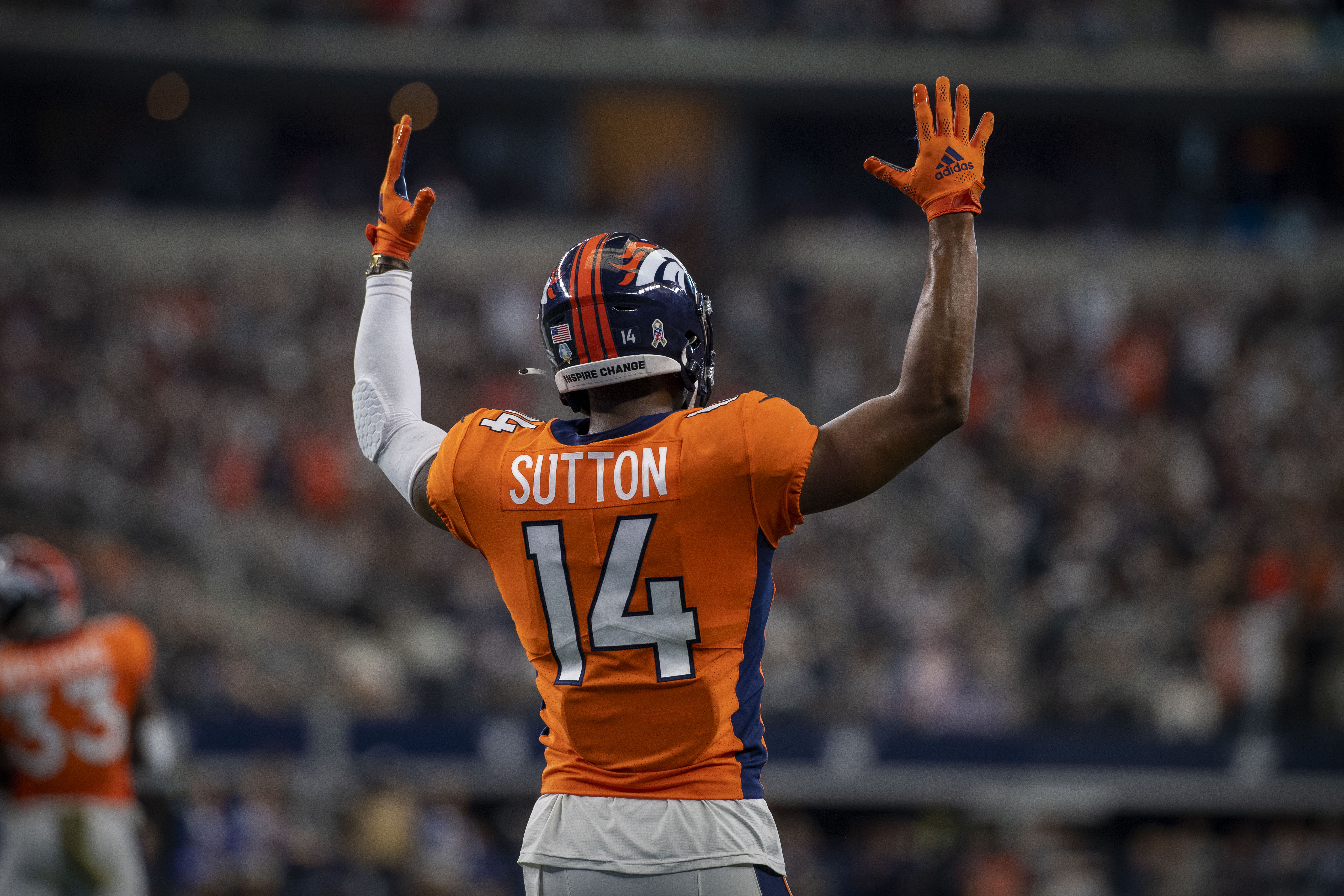 Denver Broncos wide receiver Courtland Sutton (14) celebrates a touchdown against the Dallas Cowboys during the second half at AT&T Stadium.