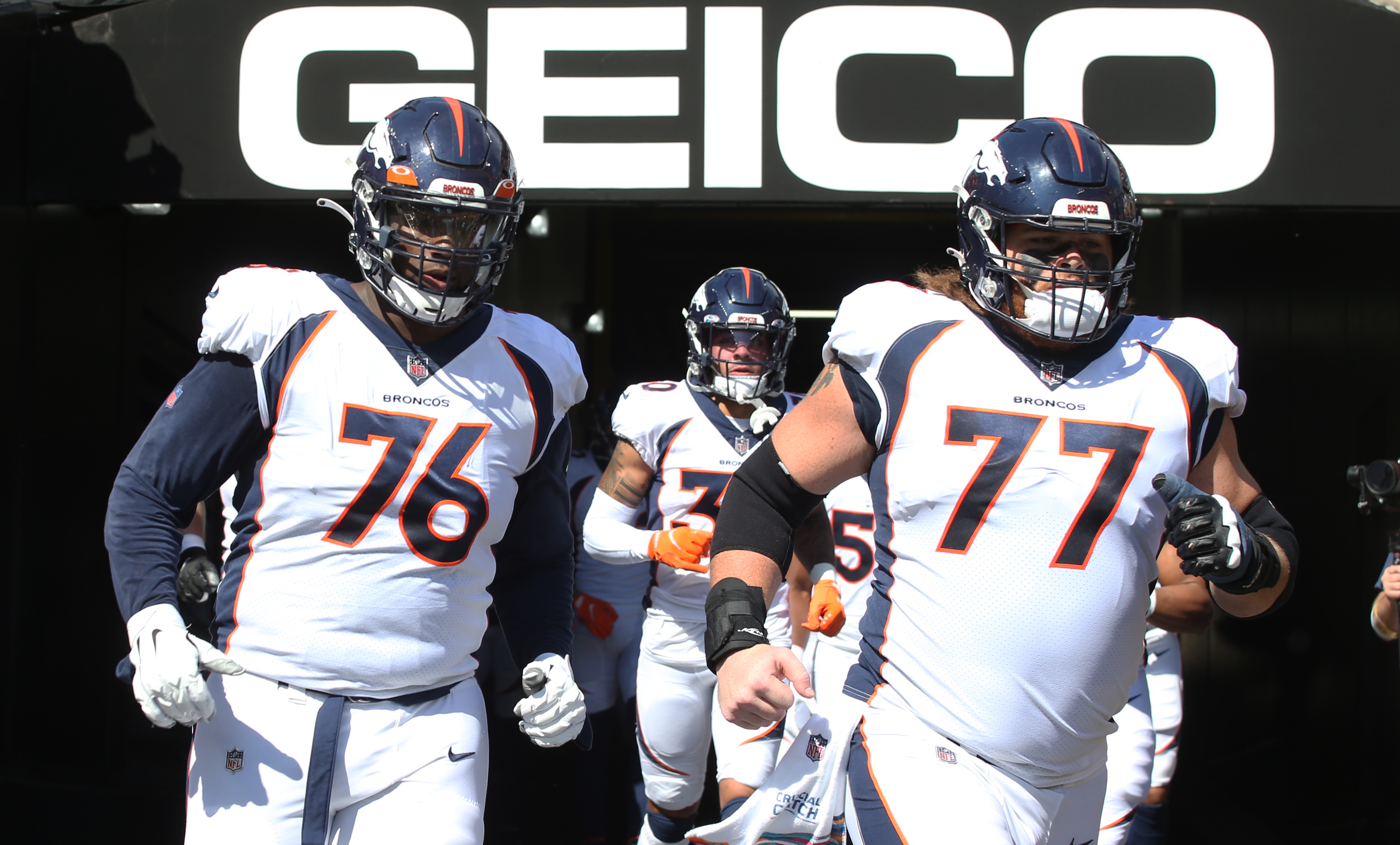 NFL: Denver Broncos at Pittsburgh Steelers Denver Broncos offensive tackle Calvin Anderson (76) and guard Quinn Meinerz (77) take the field to play the Pittsburgh Steelers at Heinz Field. The Steelers won 27-19.