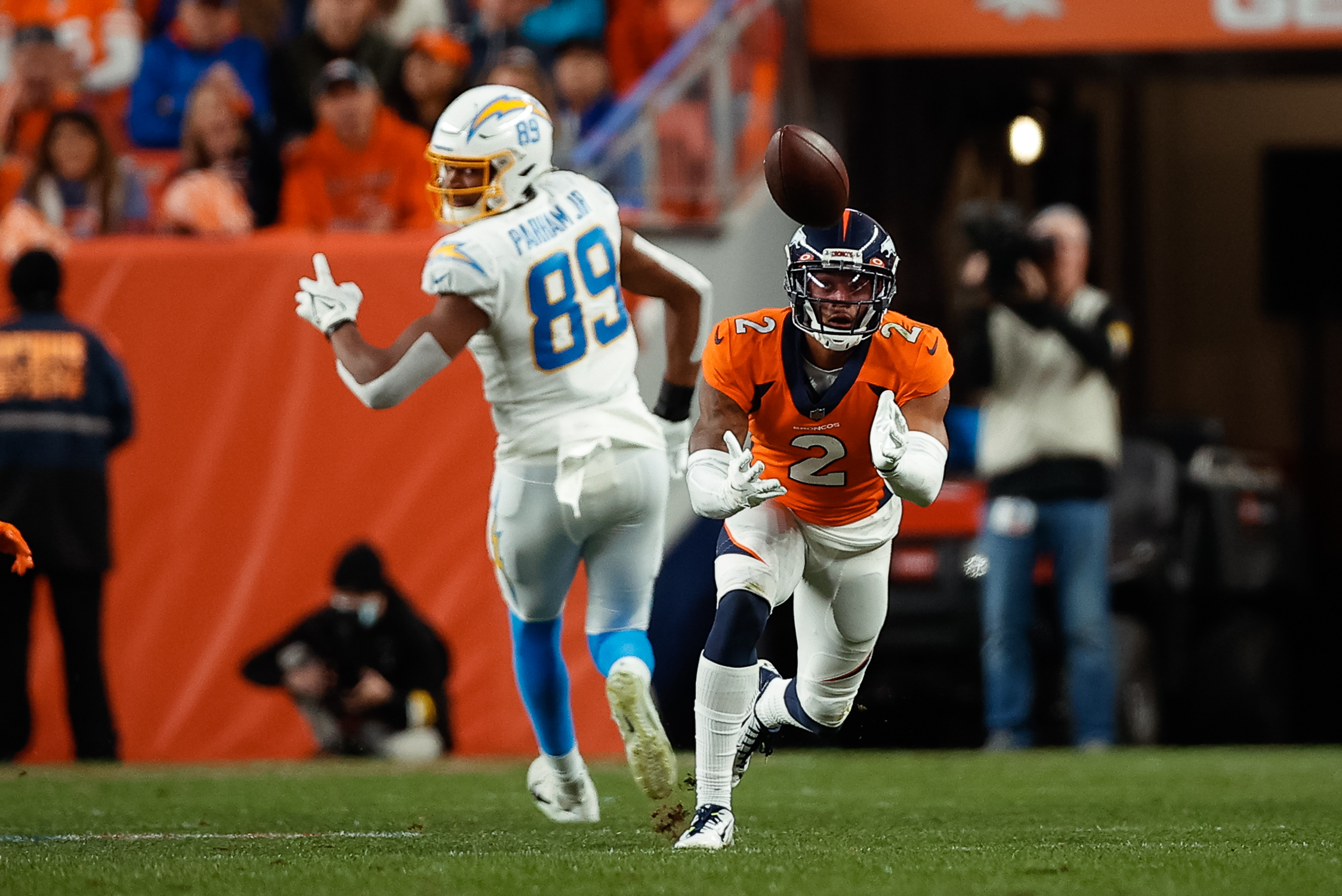 Denver Broncos cornerback Pat Surtain II (2) intercepts a ball intended for Los Angeles Chargers tight end Donald Parham Jr. (89) in the fourth quarter at Empower Field at Mile High.