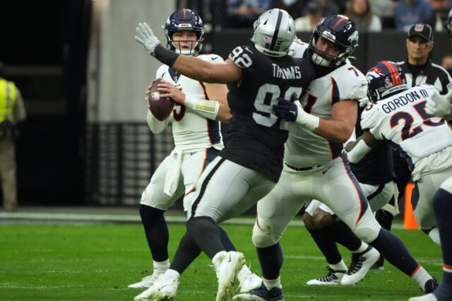 Denver Broncos quarterback Drew Lock (3) throws the ball against the Las Vegas Raiders in the first half at Allegiant Stadium