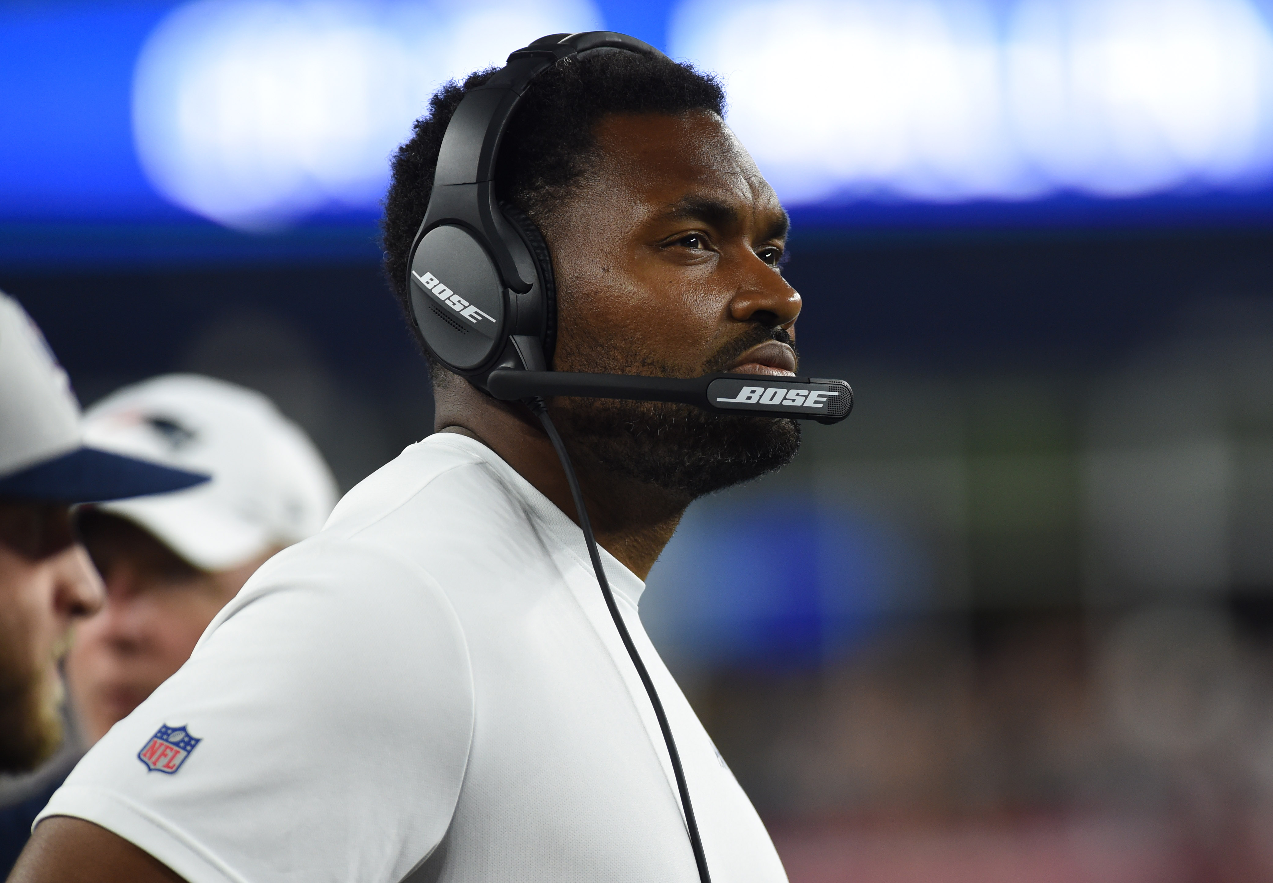 New England Patriots linebackers coach Jerod Mayo watches the action during the second half against the New York Giants at Gillette Stadium.