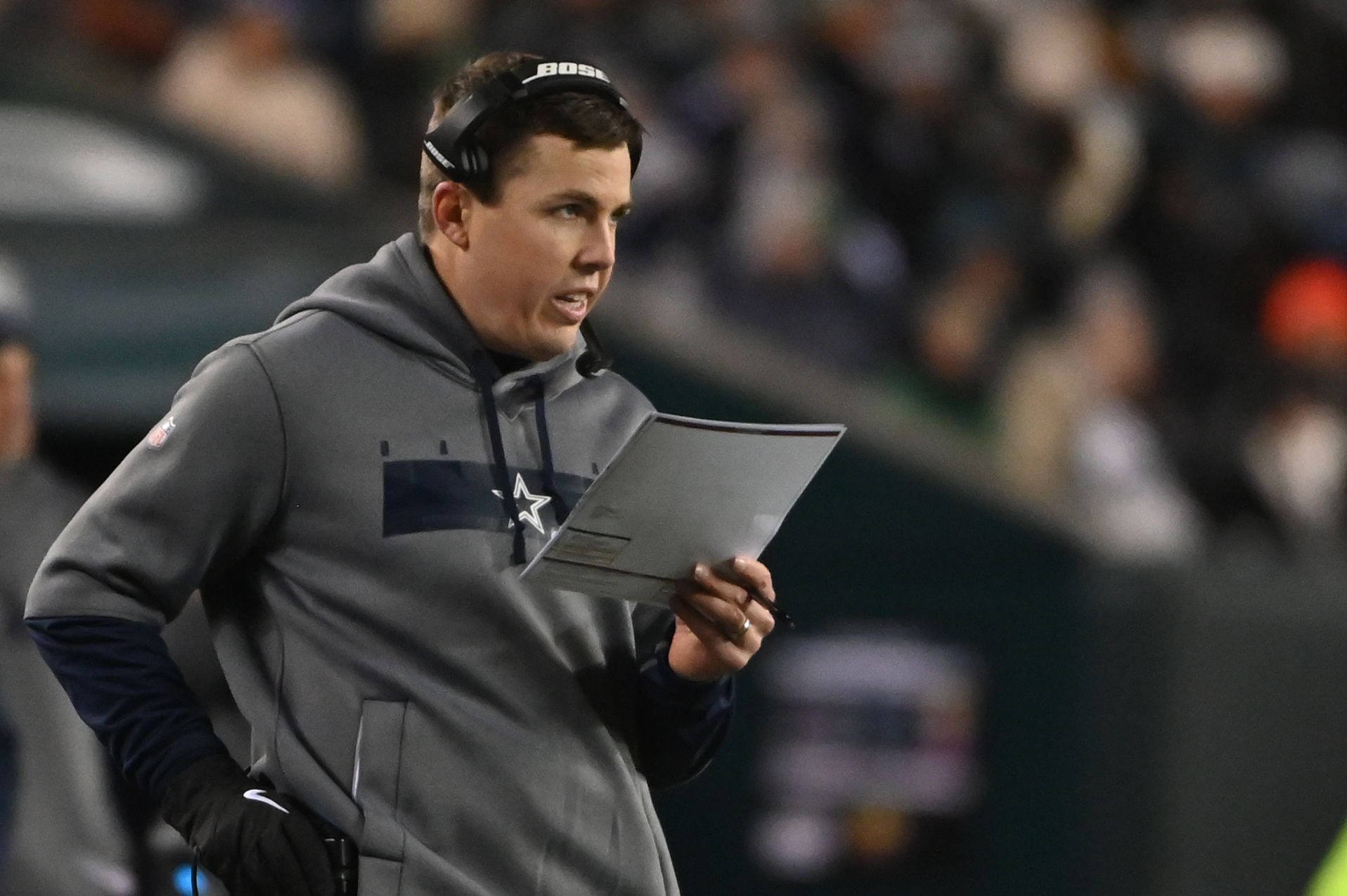 Dallas Cowboys offensive coordinator Kellen Moore stands on the sidelines against the Philadelphia Eagles during the second quarter at Lincoln Financial Field.