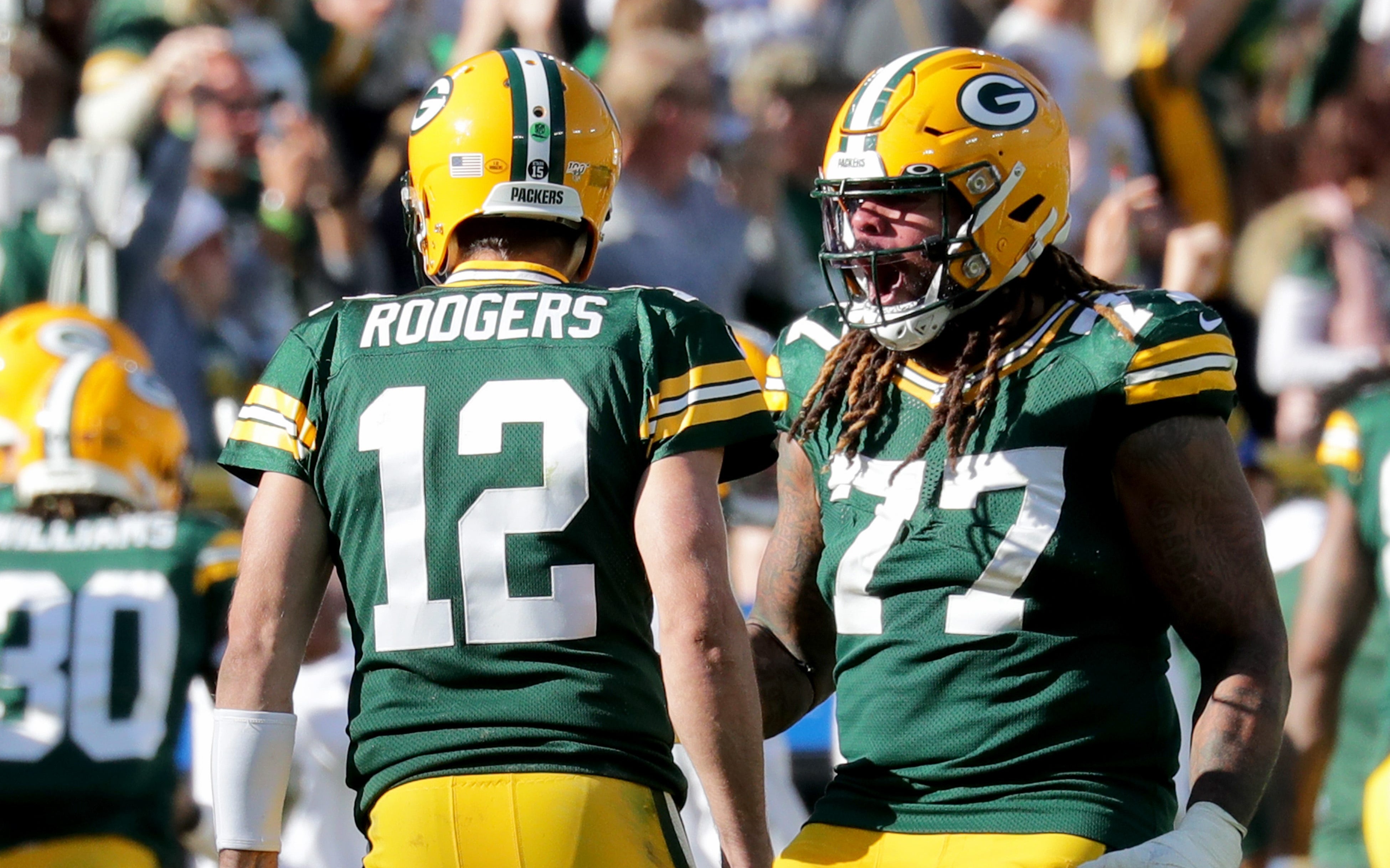 Billy turner and Aaron Rodgers. Credit: Mike De Sisti, USA TODAY Sports.